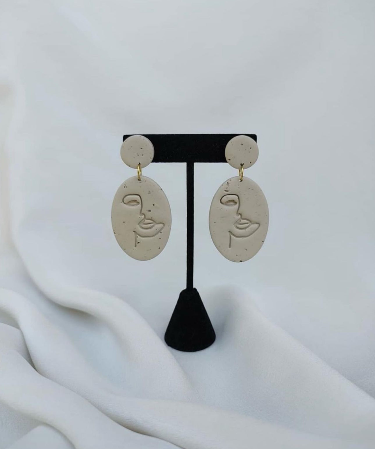 clay face earrings